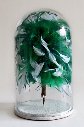 "The Poet’s Wings VIII", 2016. Matches, feathers, wood, sandpaper and glass lantern. 20 x 12 cm.