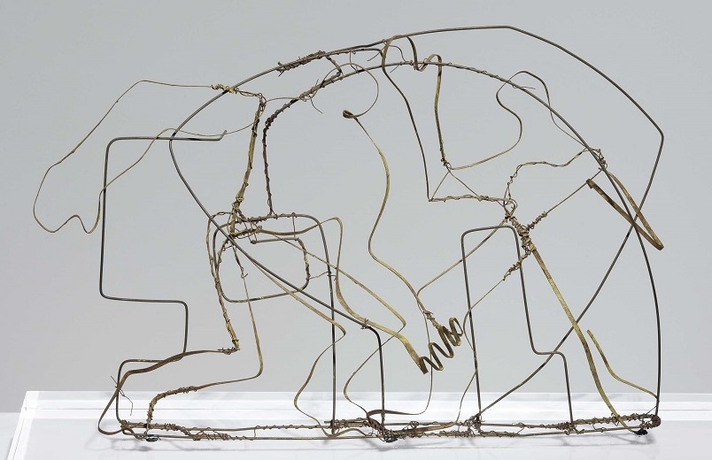 "Obreros trabajando". 1949. Cintilla de latón. 23 x 48 x 8 cm.