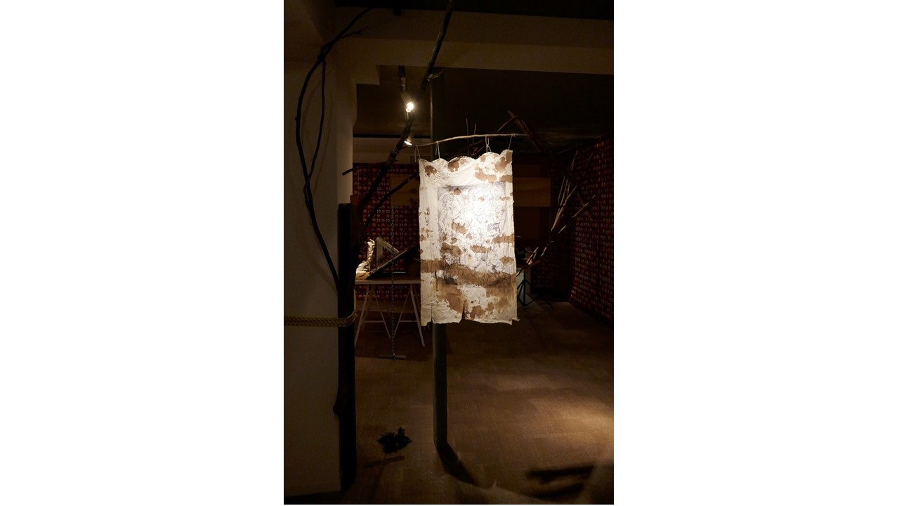 "Desiderium", 2020. Branches, ropes, thread and fabric with print and the artist's blood stains.