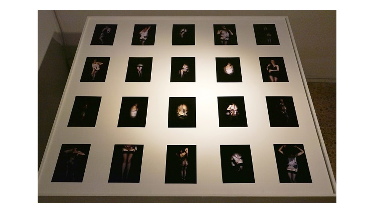 "Untitled (to Molinier)", 2020. Installation of 20 photographs. 112 x 112 cm.