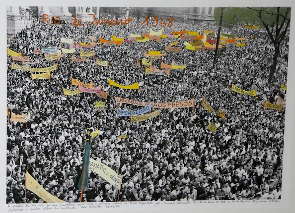 "Rio de Janeiro, Passeata dos cem mil 1, 1968". From the series "1968: The Fire of Ideas", 2015. Black and white archival photograph © Evandro Teixera, 1968, intervened with handwritten texts by the artist. Printed with hard pigment inks on Hahnemühle paper. 60 x 90 cm. Monotype. Ed. 7