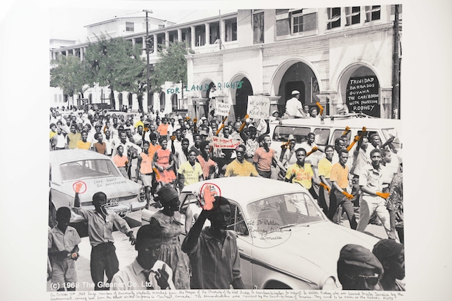 "Kingston, 1968." From the series "1968: The Fire of Ideas," 2016. Black and white archival photograph © The Gleaner Co. Ltd, 1968, intervened with handwritten text by the artist. Printed with hard pigment inks on Hahnemühle paper. 60 x 90 cm. Monotype. Ed. 7