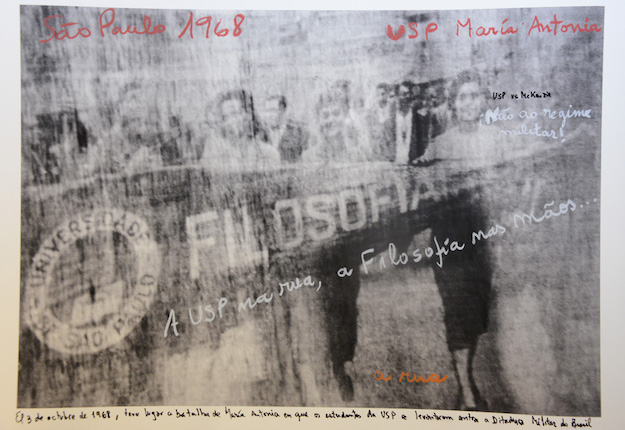 "USP, SP, 1968". From the series "1968: The Fire of Ideas", 2014-2018. Black and white archival photograph © Marcelo Brodsky 2002, intervened with handwritten texts by Marcelo Brodsky, 2014. Print with hard pigment inks on Hahnemühle paper. 60 x 90 cm. Ed. 7